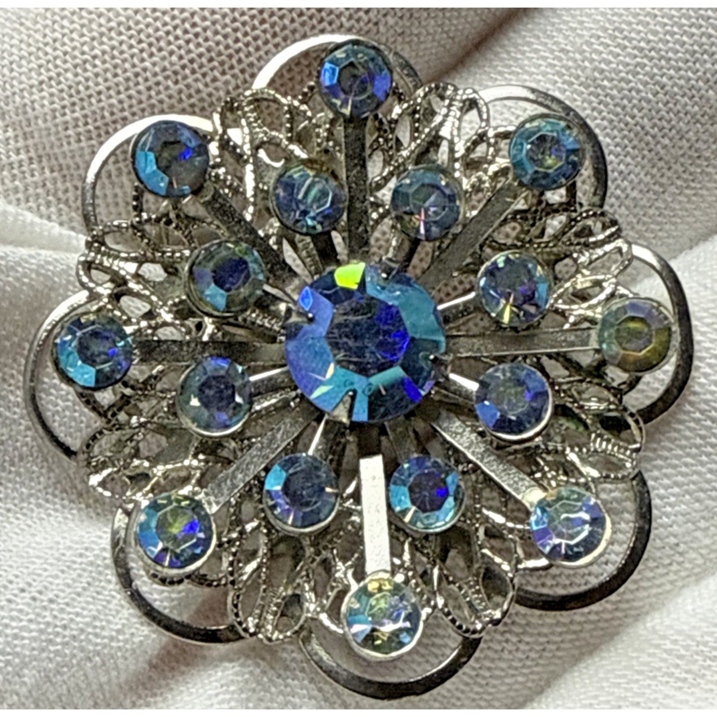 Vintage Aurora Borealis Rhinestone Silver Tone Filigree Layered Flower Brooch