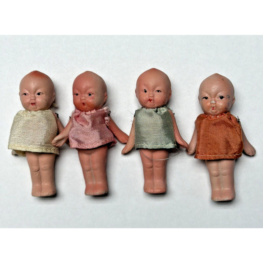 Old Lot of 4 Bisque Porcelain Baby Dolls Miniature Jointed Arms Dresses As Is