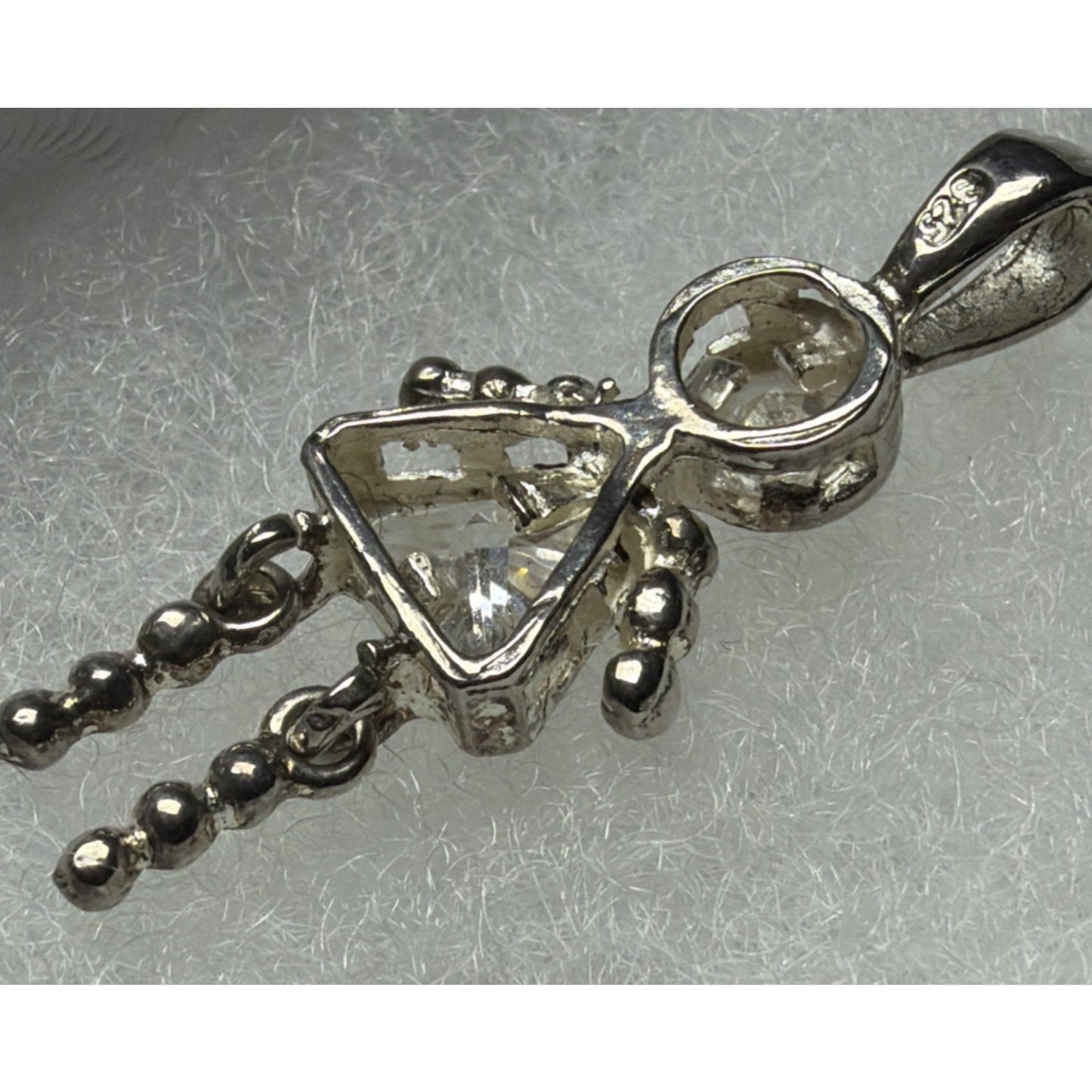925 Sterling Silver White CZ April Birthstone Girl Articulated Charm Pendant