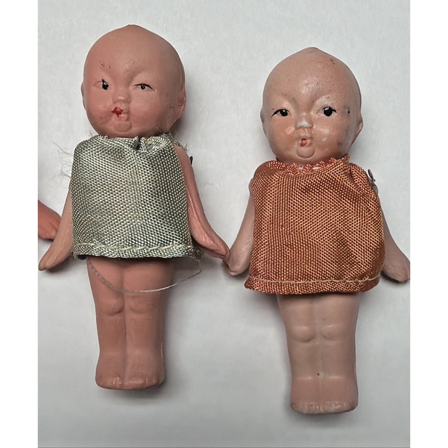 Old Lot of 4 Bisque Porcelain Baby Dolls Miniature Jointed Arms Dresses As Is