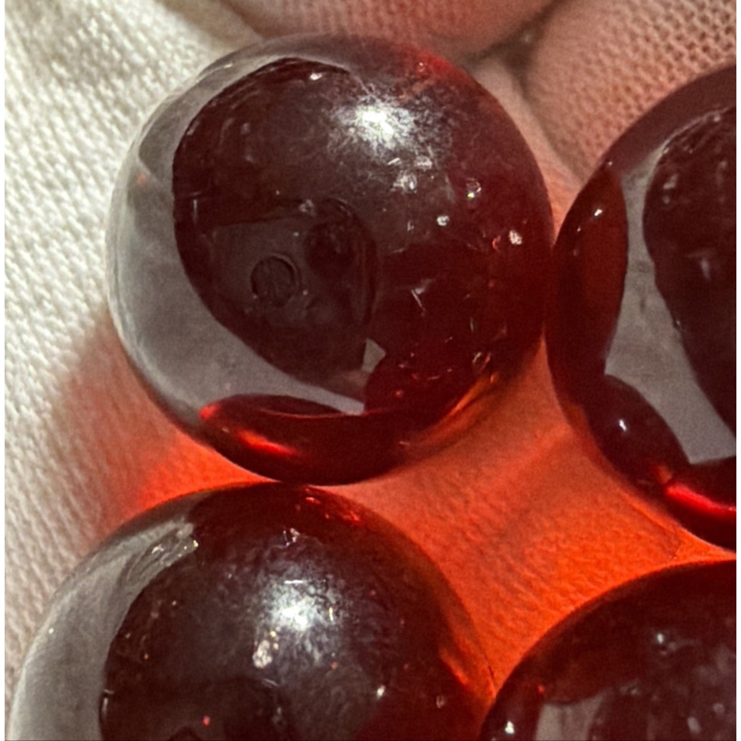 Vintage Lot of 4 Clear Ruby Red Cadmium Slag Glass Marbles UV Reactive As Is