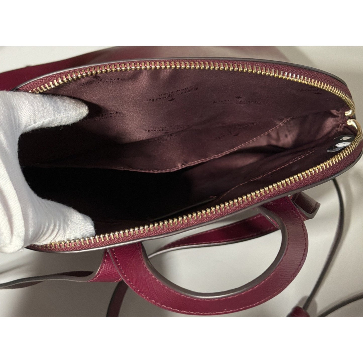 Kate Spade New York Staci Dome Saffiano Leather Backpack Burgundy