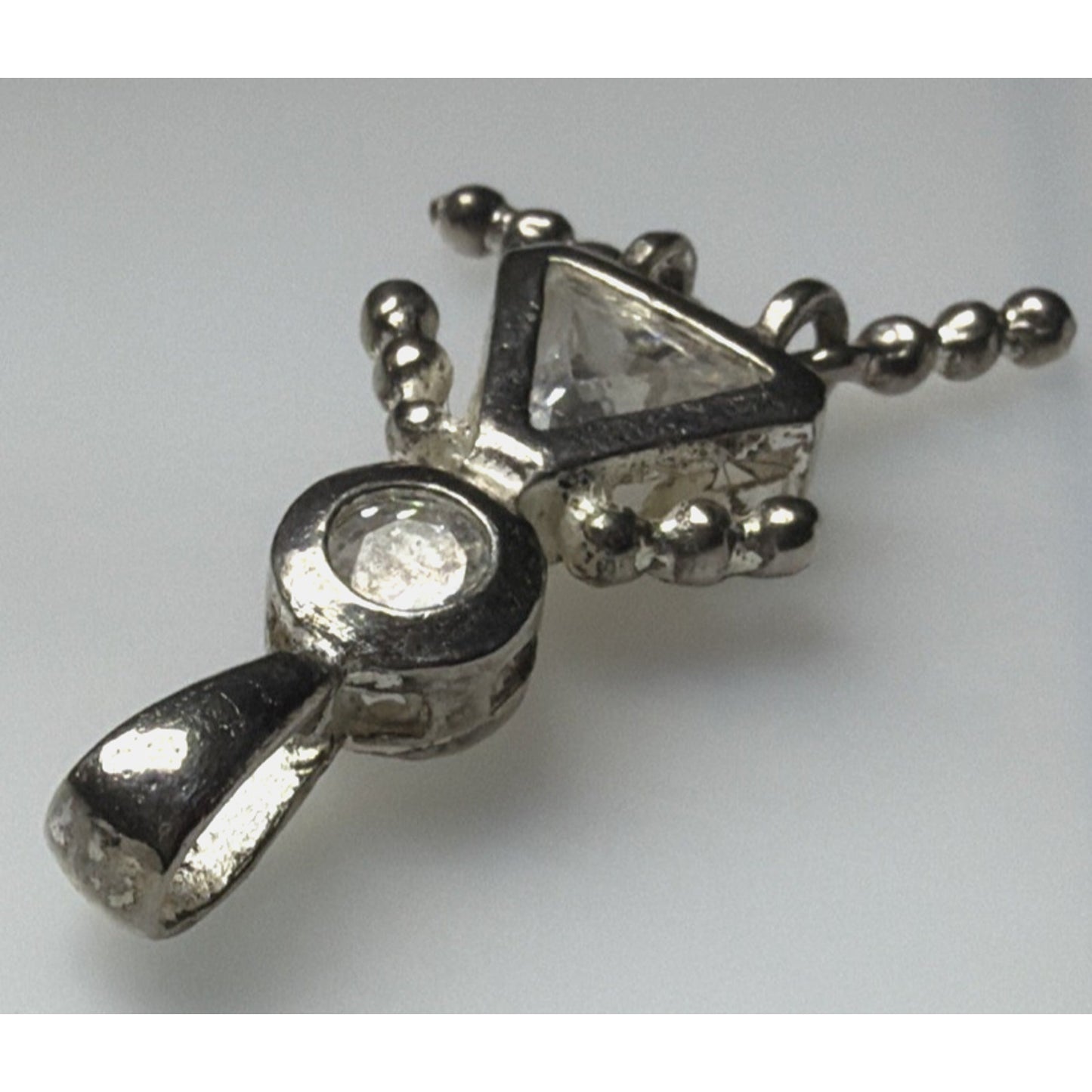 925 Sterling Silver White CZ April Birthstone Girl Articulated Charm Pendant